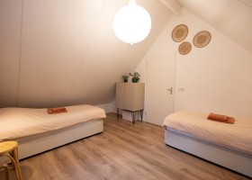 Vakantiehuis Vliegend Hert op de Veluwe, Nederland Slaapkamer-boven-voorzijde Vakantiehuis Vliegend Hert 30pluskids